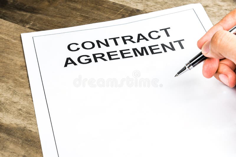 Signing on blank contract agreement paper stock images Signing on blank contract agreement paper stock images
