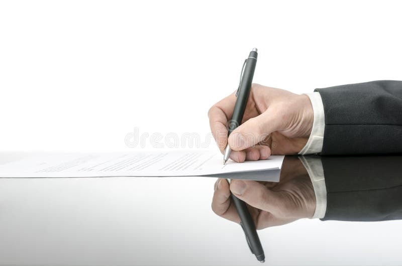 Signing a contract on a black table