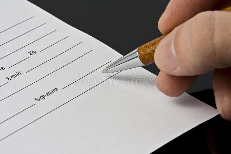 Signing the document stock image