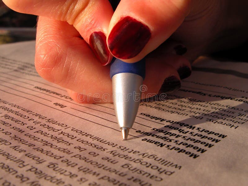 Signing model release royalty free stock photos