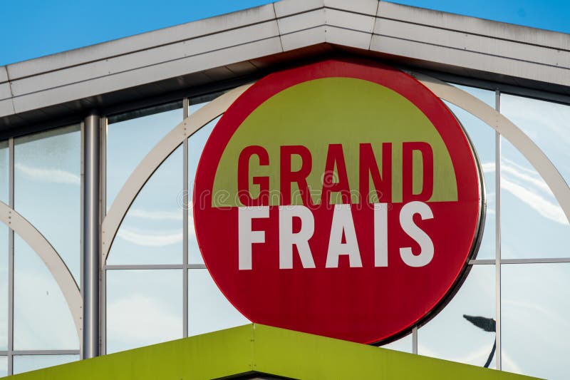 Goussainville, France - May 3, 2024: Sign and logo of a Grand Frais store. Grand Frais is a French supermarket chain specializing in fresh products and groceries. Goussainville, France - May 3, 2024: Sign and logo of a Grand Frais store. Grand Frais is a French supermarket chain specializing in fresh products and groceries