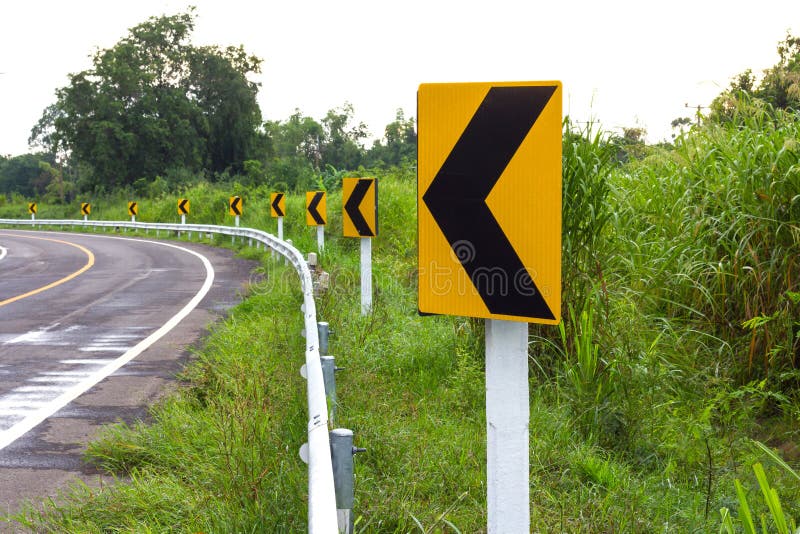 Signs left turn ahead.