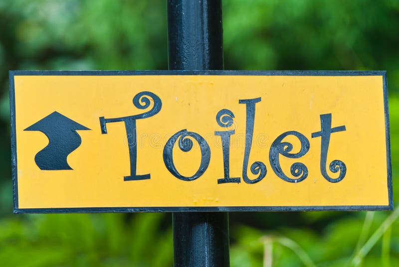 Signs To The Toilet Black Lettering On A Background Of The Cement