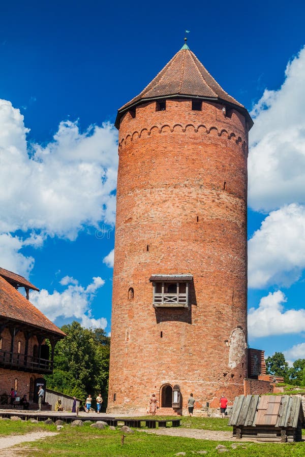 SIGULDA, LATVIA - AUGUST 20, 2016: Brick tower at Turaida castle Latvia. SIGULDA, LATVIA - AUGUST 20, 2016: Brick tower at Turaida castle Latvia