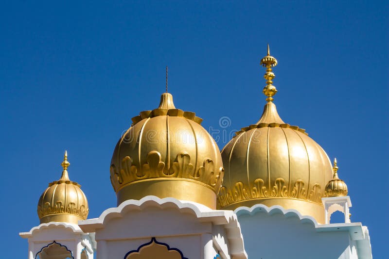 Sikh temple golden domes on the roof stock photos Sikh temple golden domes on the roof stock photos