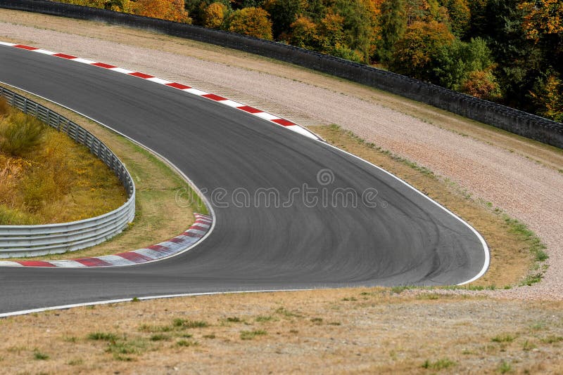 View on empty race track circuit with red white curbs motorsport concept racing background. View on empty race track circuit with red white curbs motorsport concept racing background