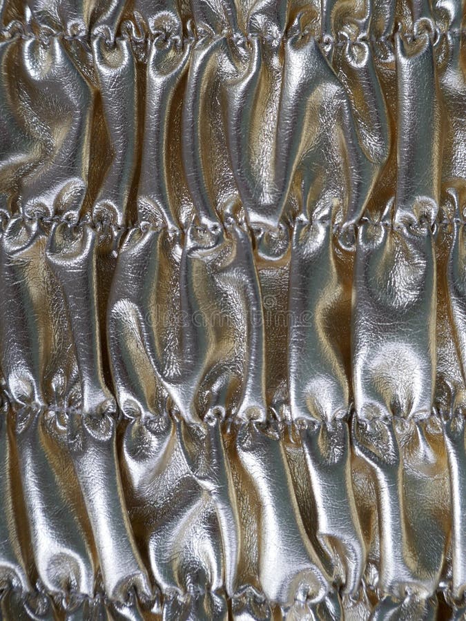 Silver shiny shirred background. Metallic texture. Silver shiny shirred background. Metallic texture