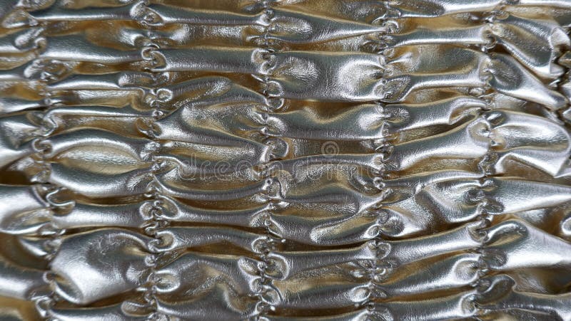 Silver shiny shirred background. Metallic texture. Silver shiny shirred background. Metallic texture