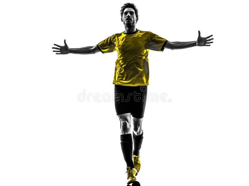 Silhoue novo brasileiro do homem da alegria da felicidade do jogador de futebol do futebol fotografia de stock Silhoue novo brasileiro do homem da alegria da felicidade do jogador de futebol do futebol fotografia de stock