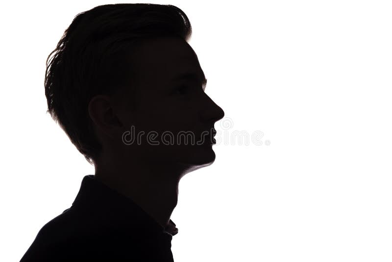 Silhouet van een onherkenbare kerel, het profiel van het mensengezicht op een wit geïsoleerde achtergrond stock afbeeldingen Silhouet van een onherkenbare kerel, het profiel van het mensengezicht op een wit geïsoleerde achtergrond stock afbeeldingen
