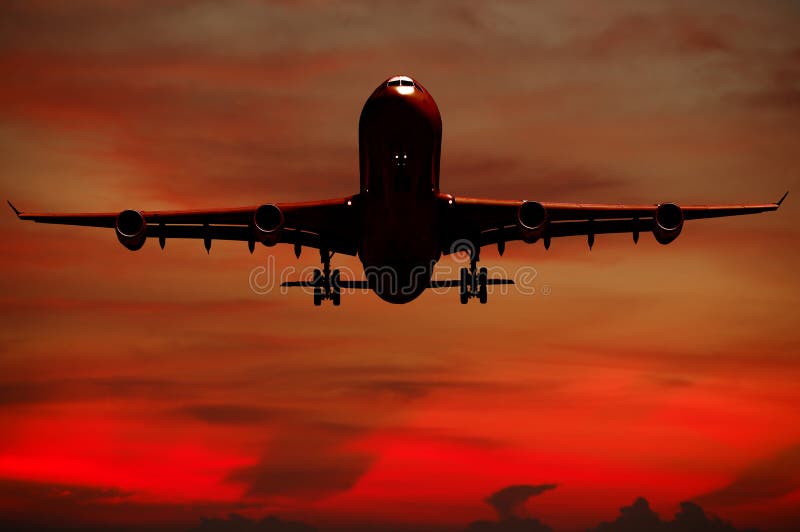 Silhouett of plane and sunset