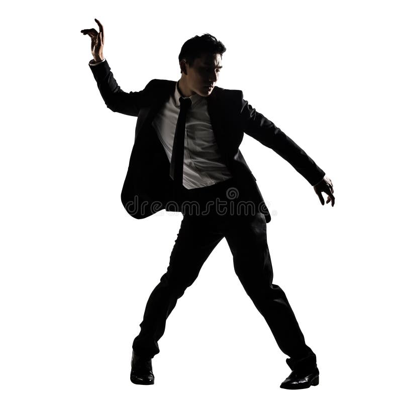 Silhouette of Asian businessman dancing or posing