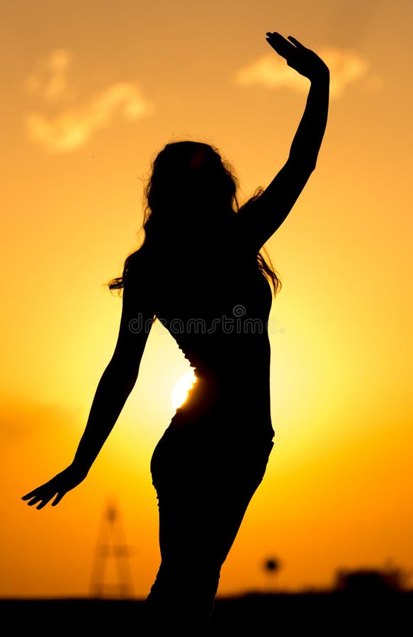 Silhouette of a Beautiful Girl at Sunset Stock Image Image of happy