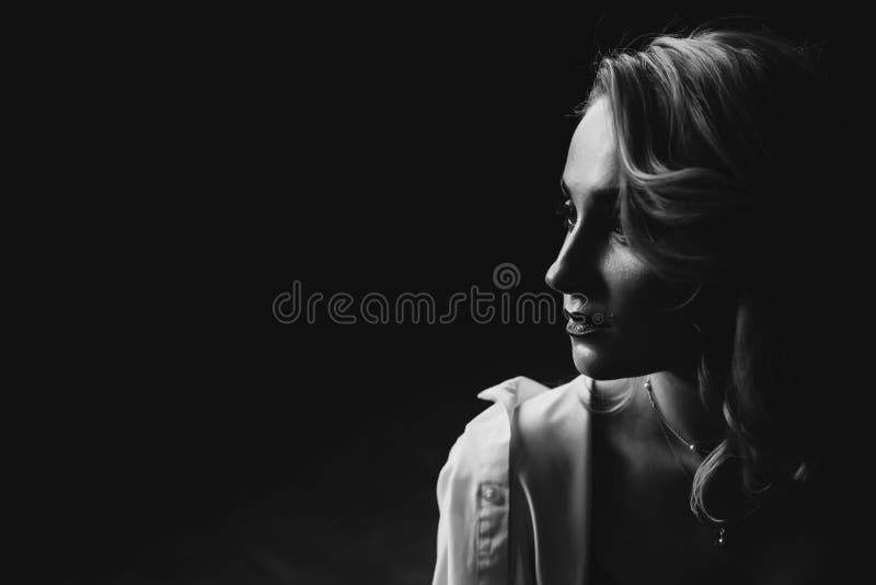 Profile of a Sad Young Woman Silhouette in Swimsuit Stock Image