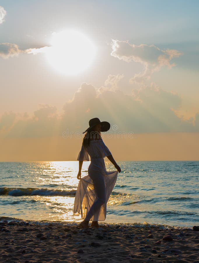 Silhouette of beautiful young woman