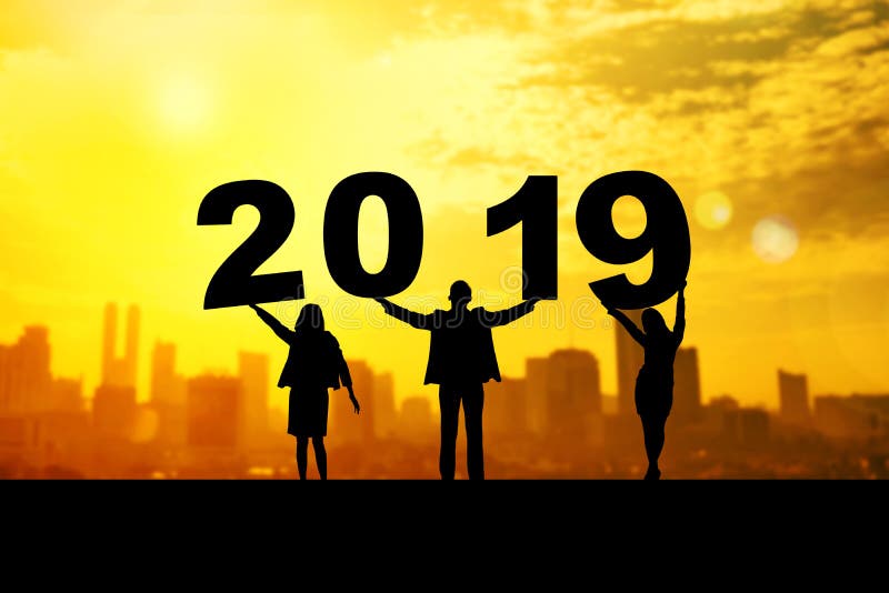 Silhouette of business people raised 2019 number royalty free stock photography Silhouette of business people raised 2019 number royalty free stock photography