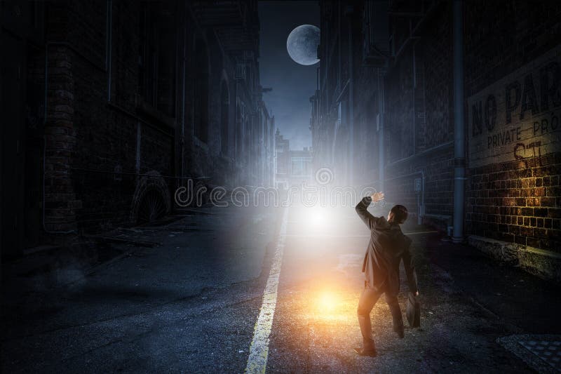 Silhouette of businessman in the darkness stock photos
