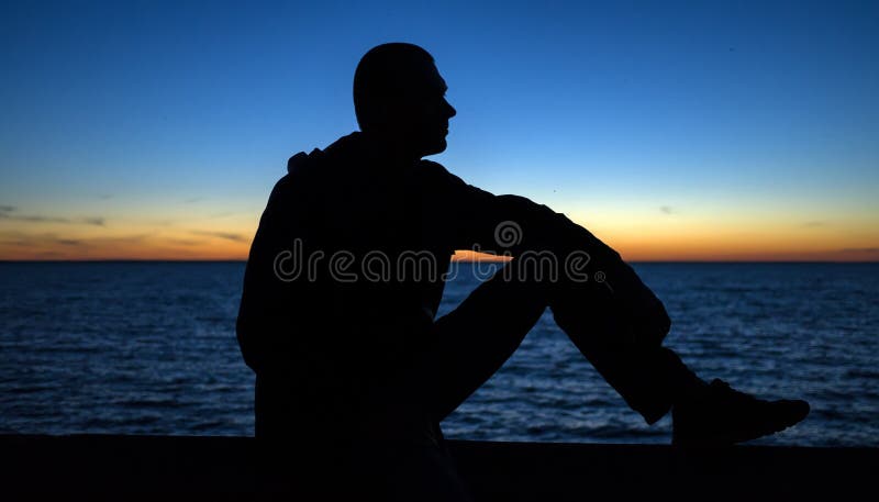 Silhouette of the girl face profile of an unrecognizable sad, woman in  depression put her hand to forehead Stock Photo by ©fantom_rd 168699036