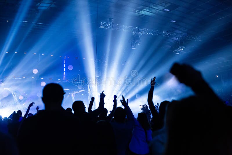 Silhouette of a Concert Crowd. the Audience Looks Towards the Stage ...