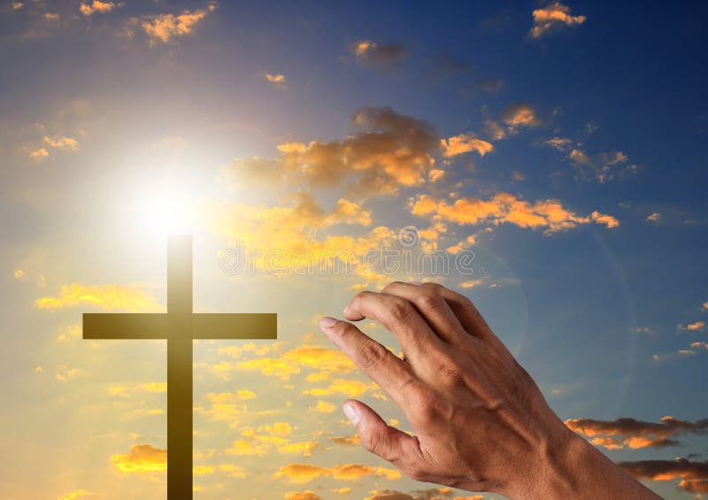 Silhouette cross in blue sky background stock photo Silhouette cross in blue sky background stock photo