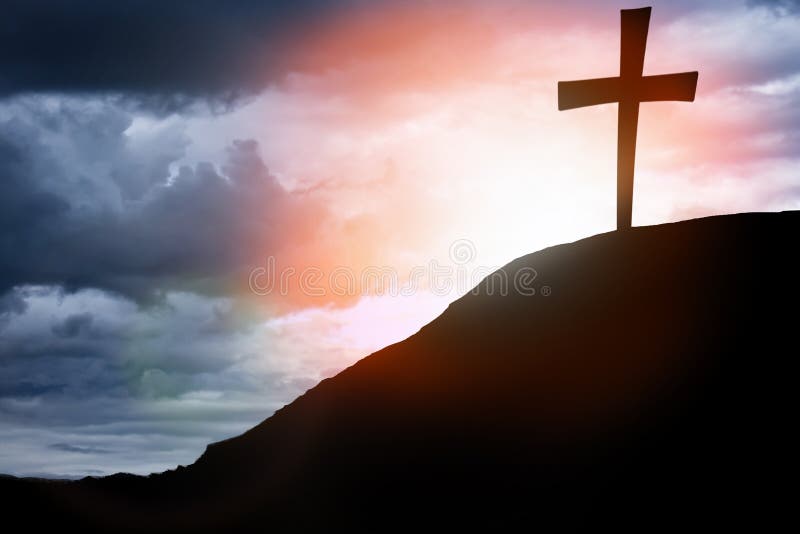 Silhouette cross on Calvary mountain sunset background. Easter concept