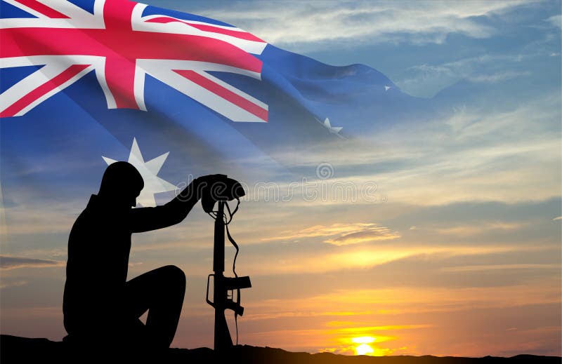 Silhouette d'un soldat agenouillé avec le drapeau australien image libre de droits