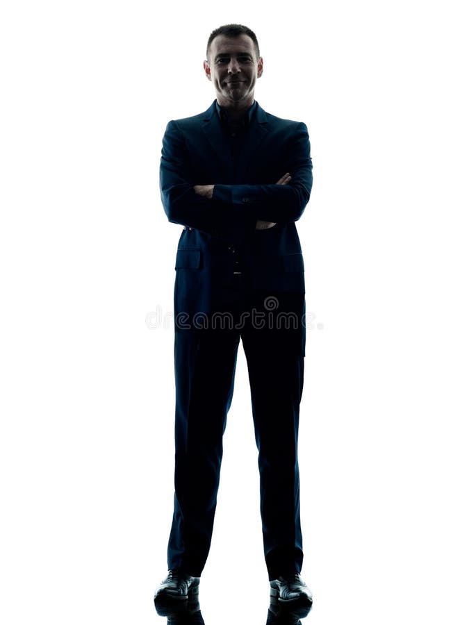 Silhouette debout d'homme d'affaires d'isolement images stock