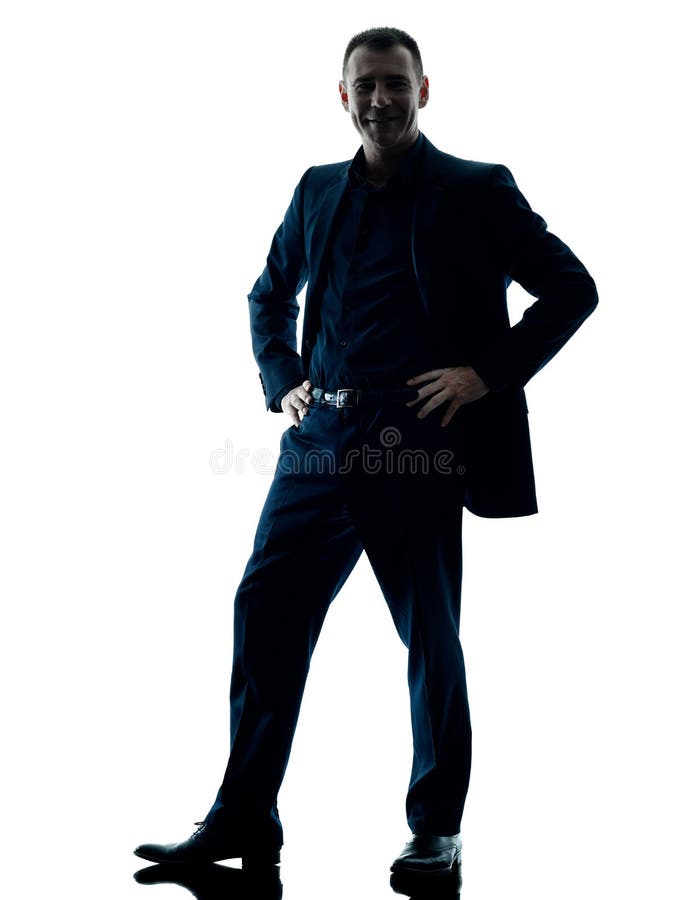 Silhouette debout d'homme d'affaires d'isolement photo stock