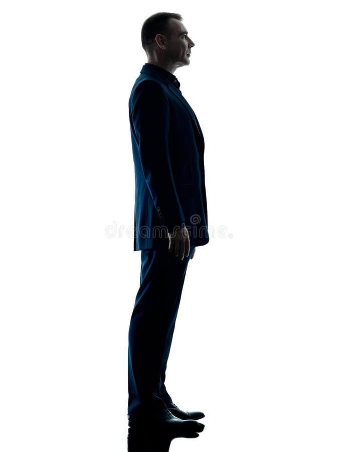 Silhouette debout d'homme d'affaires d'isolement photographie stock