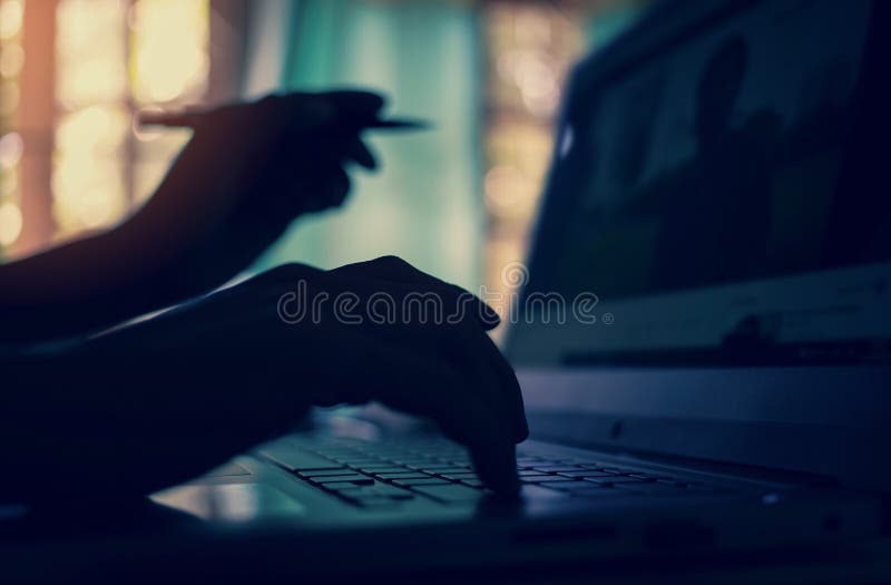 Soft focus, developer programmer typing and checking Website on laptop professional computer at the room office stock photo