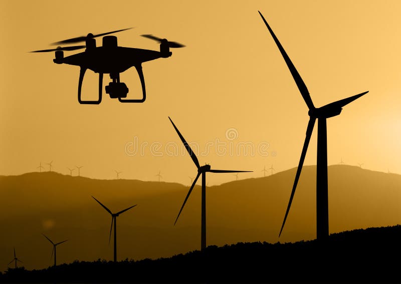 Silhouette of drone and wind turbines royalty free stock photos