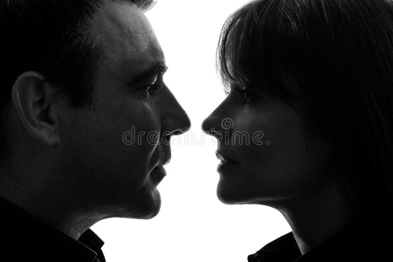 Silhouette face à face d'homme de femme de couples