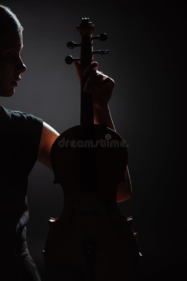 Of female musician holding violin on royalty free stock photography Of female musician holding violin on royalty free stock photography