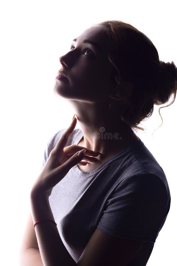 Silhouette of figure of beautiful girl, woman profile on white isolated background, concept of beauty and fashion royalty free stock photography Silhouette of figure of beautiful girl, woman profile on white isolated background, concept of beauty and fashion royalty free stock photography