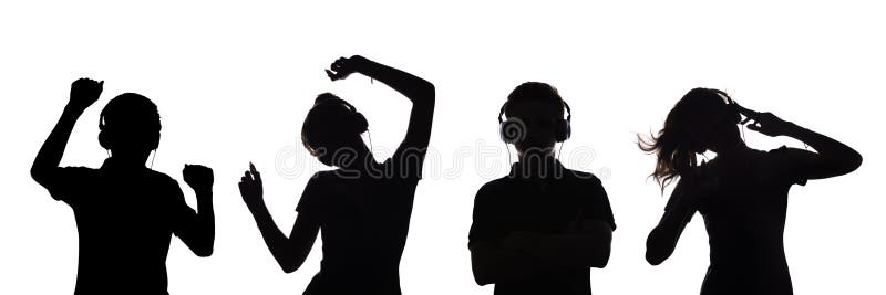 Silhouette of figures of a couple of teenagers in headphones listening to music, the guy and the girl are dancing with hands up