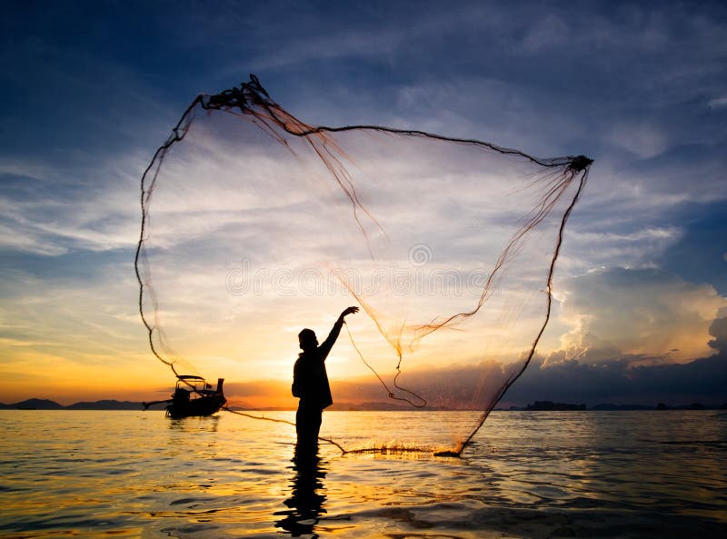 Silhouette Of Fisherman Casting Fishing Net Into The Sea ...