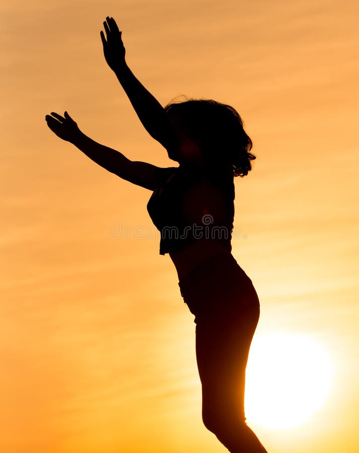 Silhouette of a girl in the sunset stock photos Silhouette of a girl in the sunset stock photos
