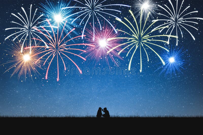 Silhouette of girls selfie on mountain and night sky with fireworks