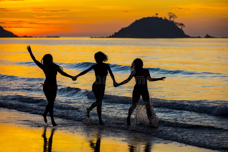 Silhouette of girls at sunset