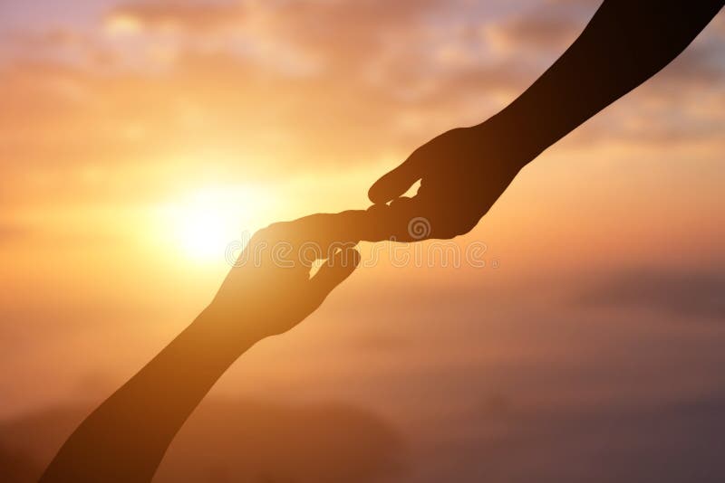 Silhouette of Giving a Helping Hand, Hope and Support Each Other Over  Sunset Stock Photo - Image of giving, sunset: 179292628