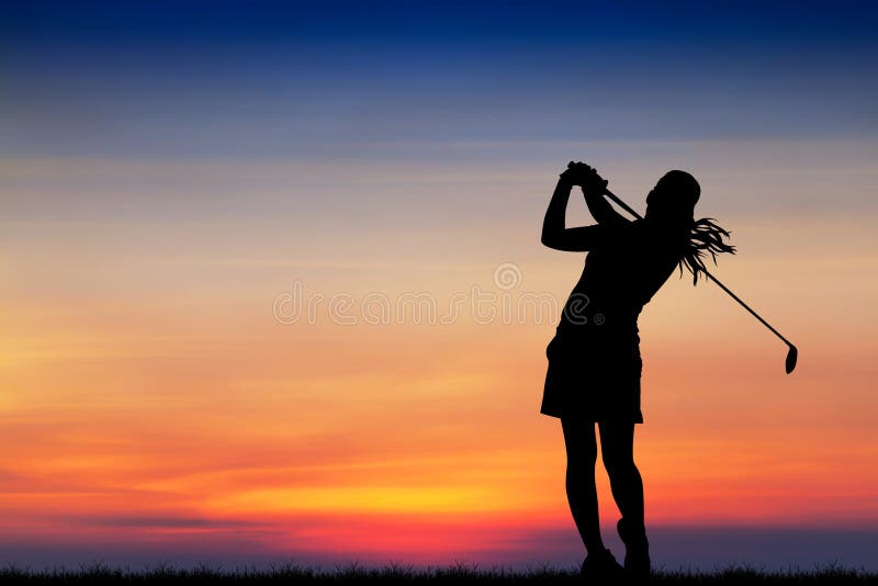 Silhouette golfer playing golf at beautiful sunset