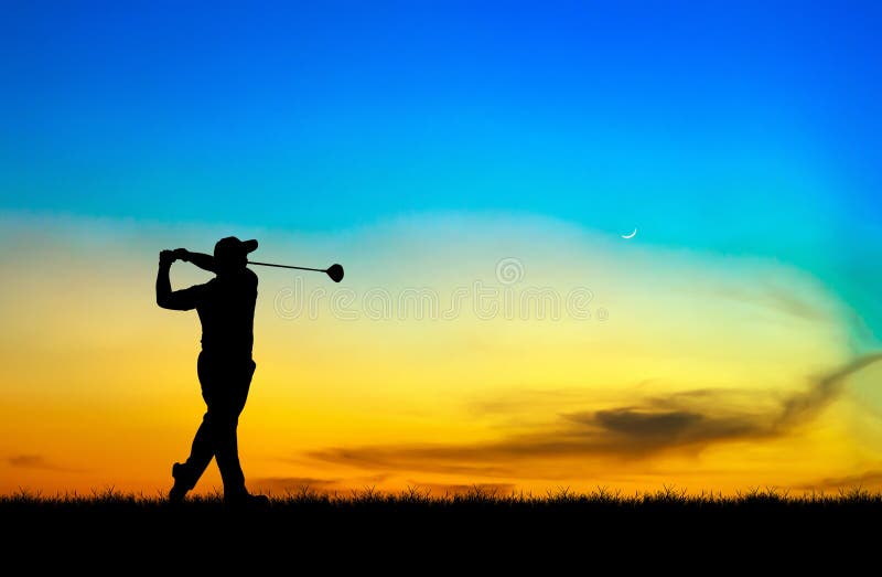 Silhouette golfer playing golf at beautiful sunset