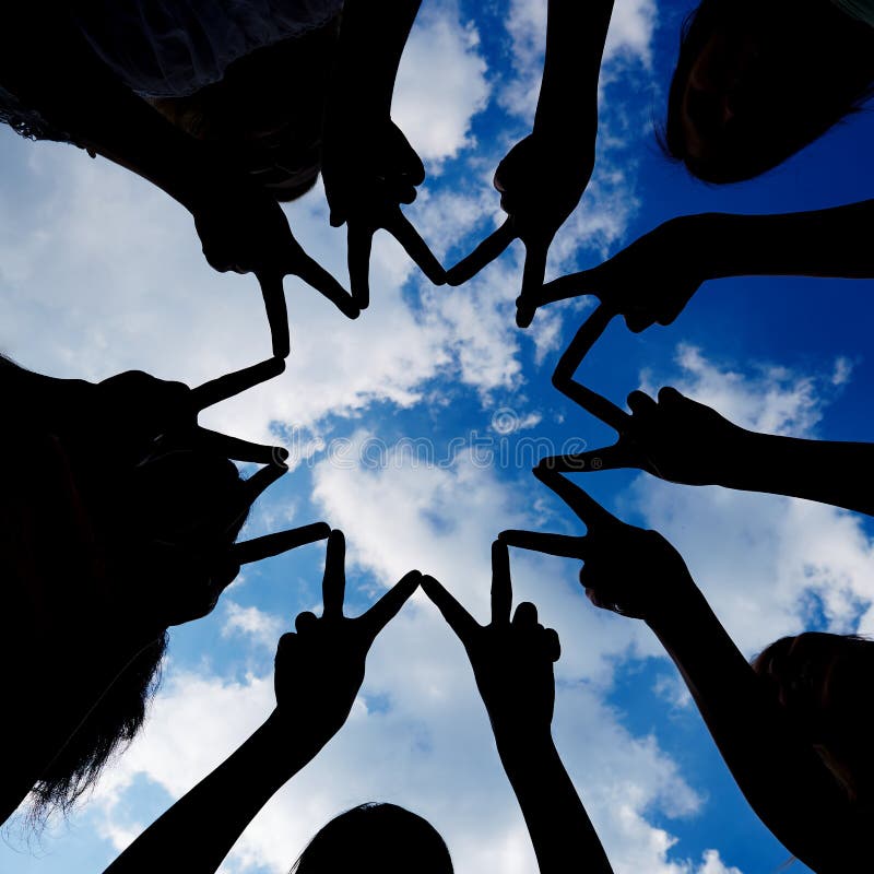 Silhouette of hands forming star network stock photography