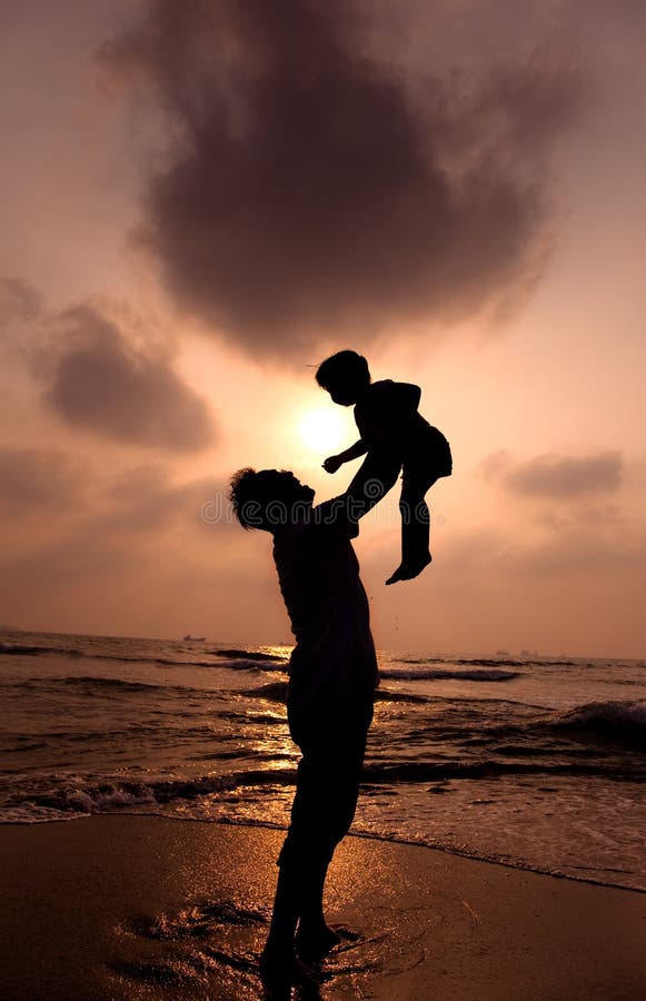 The silhouette of happy family stock photos The silhouette of happy family stock photos