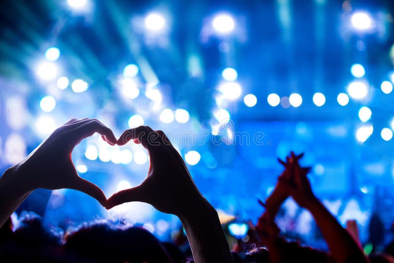 Silhouette of a heart shaped hands shadow