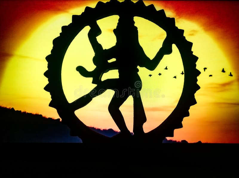 Silhouette of Indian Dancing God Shiva Nadarajah &x28;Nataraja&x29; Statue on red background. Religion or yoga concept
.