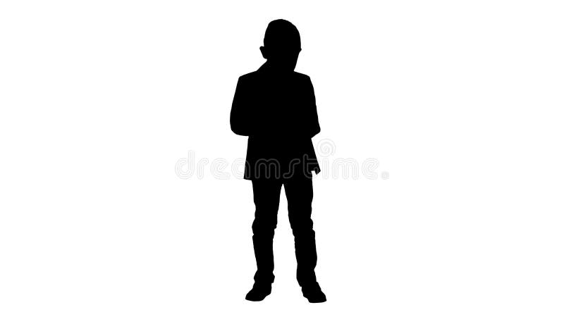 Silhouette Intelligent boy is texting message, playing online games., sending pictures, downloading music, films.