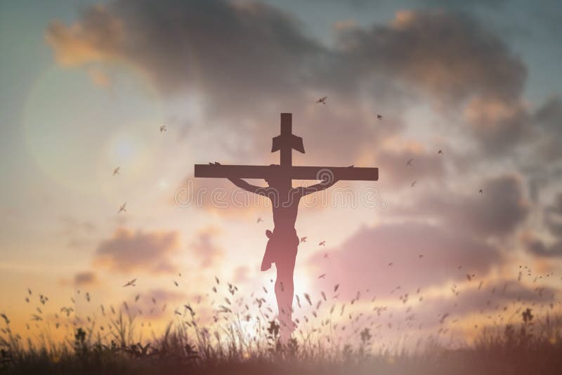 Silhouette Jesus christ death on cross crucifixion on calvary hill in sunset good friday risen in easter day concept for