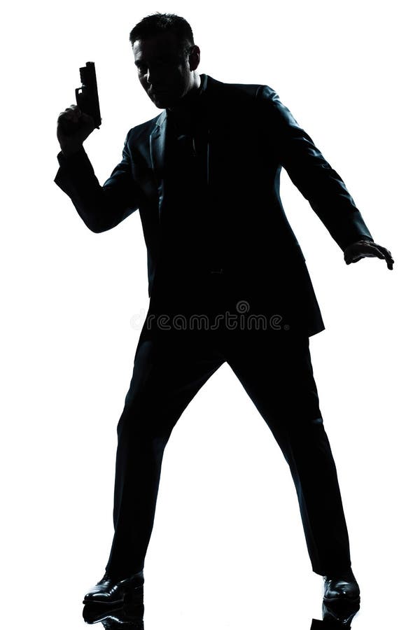 Silhouette Man Spy Holding Gun Stock Photo Image of holding, back