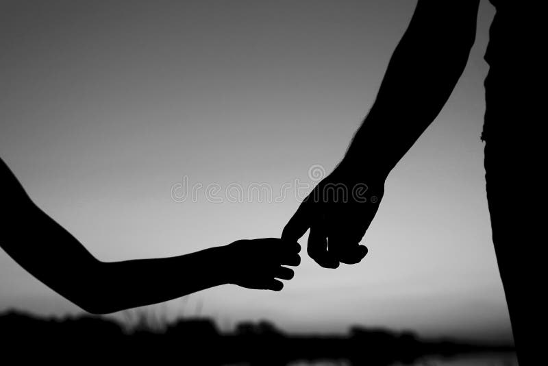 Silhouette The Parent Holds The Hand Of A Child Stock Photo Image Of Holds People
